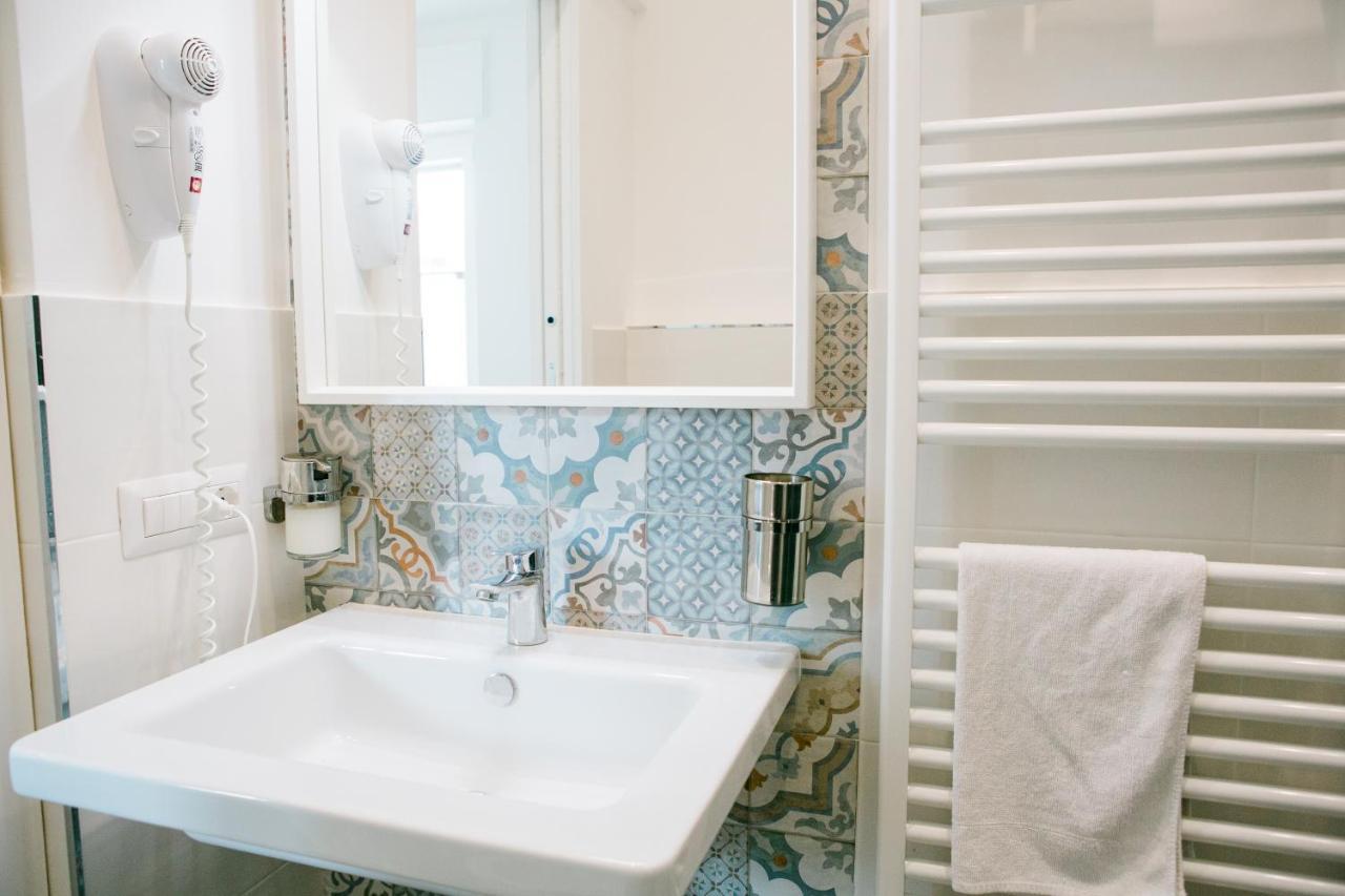 Kennedy 54 Hotel Alghero Bagian luar foto